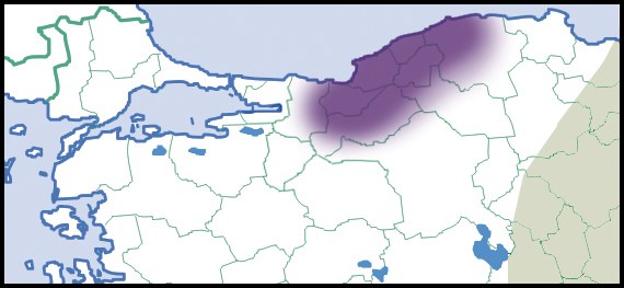 Eine Karte von Bulgarien mit in lila und grün hervorgehobenen Provinzen, eingerahmt von einem schwarzen Rand, der das Ausmaß der Balkanhalbinsel anzeigt.