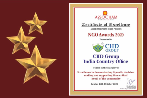Auszeichnung für excellence für die Ngo Awards 2020 mit drei Sternen links und rechts der Text 'Chd Group India Country Office' und einem Schild-Logo mit einem Stern und einem Lorbeerkranz.