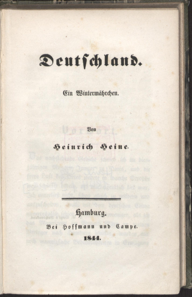 Ein altes Buch mit der Aufschrift 'Deutschland' vor schwarzem Hintergrund.