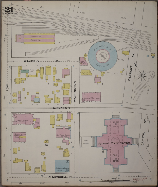 Alte Karte von Atlanta, Georgia, mit dem Georgia State Capitol in der Mitte, zeigt detaillierte Straßen, Gebäude und Sehenswürdigkeiten.