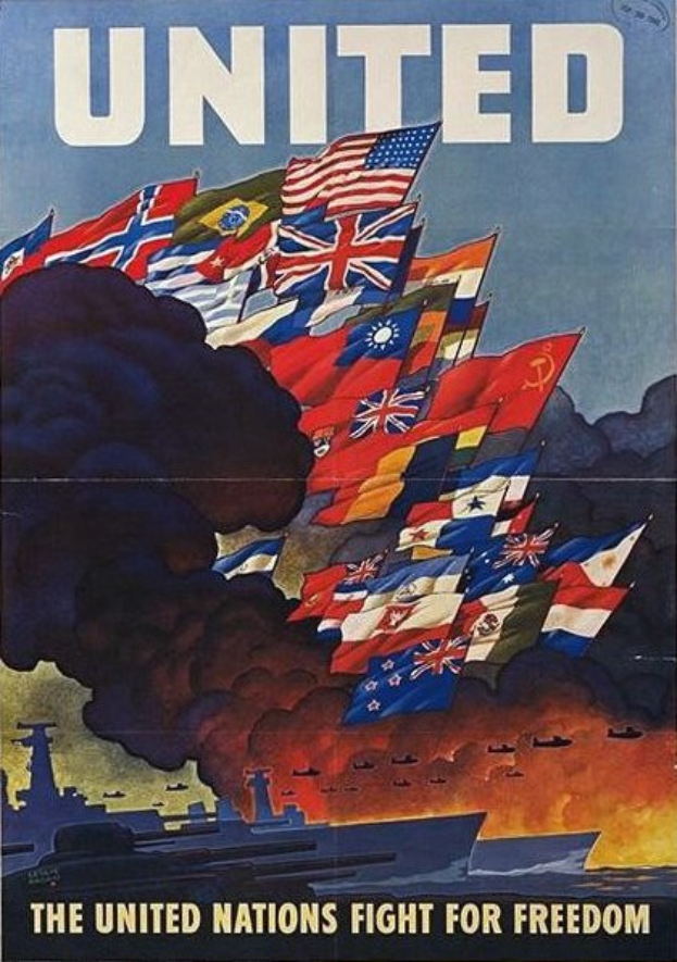 Eine Gruppe von Menschen steht vor dem beleuchteten Reichstagsgebäude in Berlin, Deutschland, umgeben von Gebäuden, Pfosten und Lichtern, und die Wörter "Kampf für die Freiheit" sind auf dem Boden im Vordergrund geschrieben.