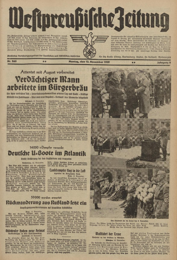 Schwarze-weisse Titelseite einer deutschen Zeitung vom 13. November 1939, betitelt "Weitpreubliche Zeitung", mit einer Gruppe von Menschen in traditioneller deutscher Kleidung in einer feierlichen Szenerie.